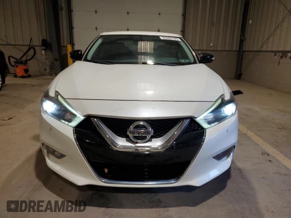 ✅ 2017 Nissan Maxima Platinum • VIN: 1N4AA6AP3HC421629 • Lot: 92696795. Listed on Copart with 89,568 mi. Free auction sales archive from the USA and detailed vehicle history report at DreamBid. Image 5.