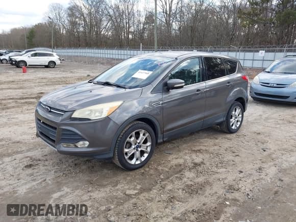 ✅ 2013 Ford Escape SEL • VIN: 1FMCU0HX8DUD68360 • Лот: 41427968. Опубликован ранее на IAAI с пробегом 129 067 миль. Бесплатный доступ к архиву аукционных продаж из США и подробный отчёт об истории автомобиля на DreamBid. Изображение 2.