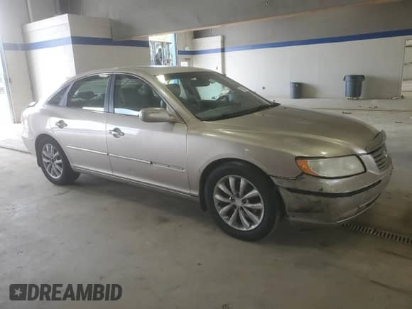 2007 Hyundai Azera SE с VIN KMHFC46F67A240688, выставлен на аукционе Copart как лот 58366345 с пробегом 261 260 миль миль и Списание • Salvage title. История ставок и продаж доступна на DreamBid. Изображение 4.