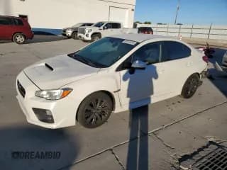 ✅ 2015 Subaru WRX • VIN: JF1VA1A6XF9827980 • Lot: 82619395. Listed on Copart with 75,973 mi. Free auction sales archive from the USA and detailed vehicle history report at DreamBid. Image 1.