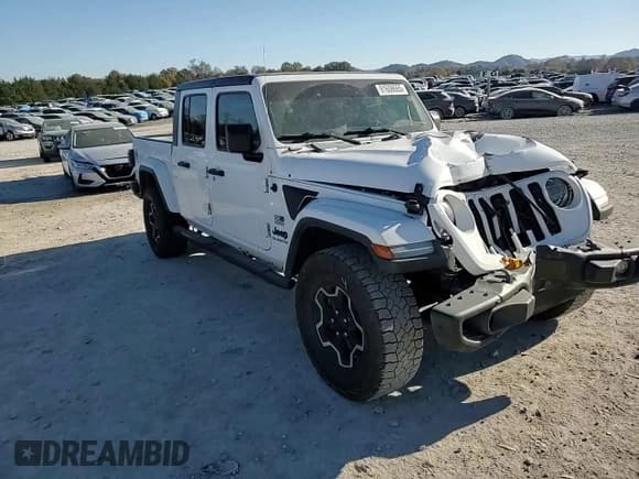 ✅ 2021 Jeep Gladiator Freedom • VIN: 1C6HJTAG8ML562950 • Lot: 91608665. Listed on Copart with 57,756 mi. Free auction sales archive from the USA and detailed vehicle history report at DreamBid. Image 13.