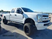 ✅ 2018 Ford F-250 XL • VIN: 1FT7W2B64JEB26408 • Lot: 42984832. Listed on IAAI with 238,266 mi. Free auction sales archive from the USA and detailed vehicle history report at DreamBid. Image 1.