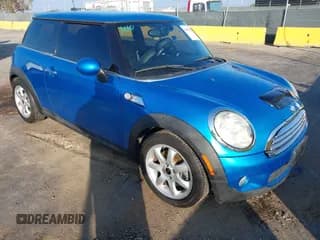 ✅ 2007 MINI Hardtop S • VIN: WMWMF73567TL91970 • Lot: 43872510. Listed on IAAI with 130,110 mi. Free auction sales archive from the USA and detailed vehicle history report at DreamBid. Image 1.