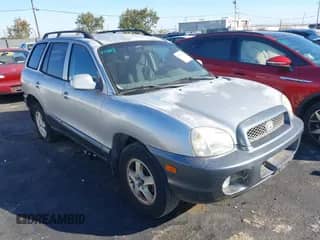 2001 Hyundai Santa Fe GLS z VIN KM8SC83D11U088270, wystawiony jako IAAI lot #43577455 z przebiegiem 159 049 mil mil oraz . Historia ofert i sprzedaży dostępna na DreamBid. Obrazek 1.