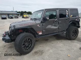 ✅ 2017 Jeep Wrangler Unlimited Rubicon Hard Rock • VIN: 1C4BJWFG4HL586760 • Lot: 71607965. Listed on Copart with 90,379 mi. Free auction sales archive from the USA and detailed vehicle history report at DreamBid. Image 1.