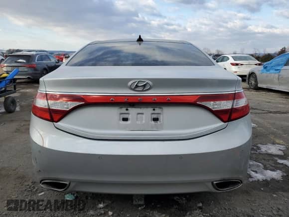 2013 Hyundai Azera z VIN KMHFH4JG5DA300781, wystawiony jako Copart lot #42493805 z przebiegiem 165 673 mil mil oraz Szkoda całkowita • Salvage title. Historia ofert i sprzedaży dostępna na DreamBid. Obrazek 6.