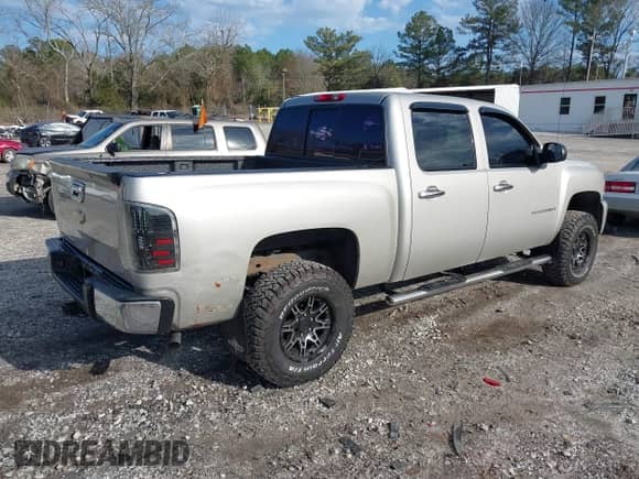 2009 Chevrolet Silverado 1500 LS with VIN 3GCEK13C89G153861, listed as a IAAI auction lot 41587774 with 179,670 mi miles and . Bid and sale history available at DreamBid. Image 4.