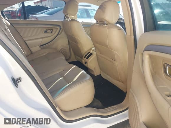 ✅ 2014 Ford Taurus SEL • VIN: 1FAHP2E88EG125566 • Lot: 43549192. Listed on IAAI with 180,204 mi. Free auction sales archive from the USA and detailed vehicle history report at DreamBid. Image 8.