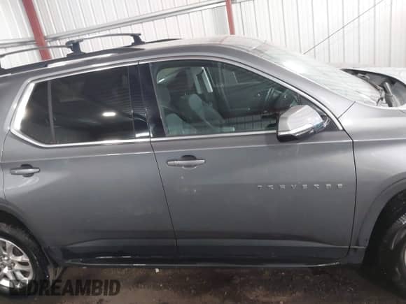 2019 Chevrolet Traverse LT Cloth z VIN 1GNERGKW5KJ123254, wystawiony jako IAAI lot #43421541 z przebiegiem 139 567 mil mil oraz . Historia ofert i sprzedaży dostępna na DreamBid. Obrazek 13.