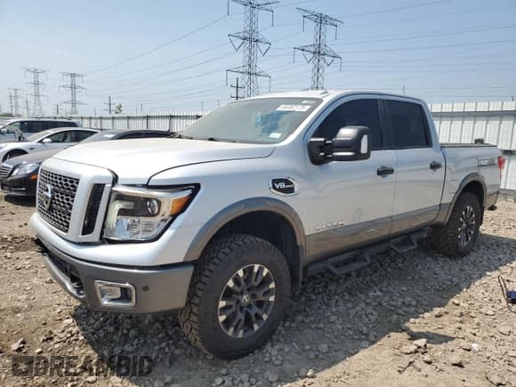 ✅ 2017 Nissan Titan Pro-4X • VIN: 1N6AA1E53HN551661 • Лот: 65382175. Опубликован ранее на Copart с пробегом 158 357 миль. Бесплатный доступ к архиву аукционных продаж из США и подробный отчёт об истории автомобиля на DreamBid. Изображение 1.