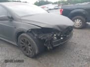 ✅ 2016 Tesla Model X 70D • VIN: 5YJXCDE28GF026378 • Lot: 42352156. Listed on IAAI with 103,206 mi. Free auction sales archive from the USA and detailed vehicle history report at DreamBid. Image 6.