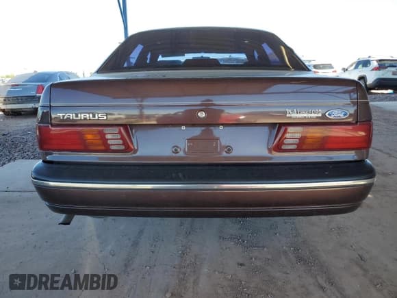 ✅ 1988 Ford Taurus LX • VIN: 1FABP5345JG210480 • Лот: 50248585. Опубликован ранее на Copart с пробегом 47 172 миль. Бесплатный доступ к архиву аукционных продаж из США и подробный отчёт об истории автомобиля на DreamBid. Изображение 6.