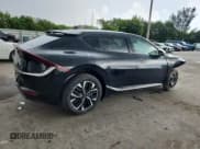 ✅ 2024 Kia EV6 Wind • VIN: KNDC34LA1R5214754 • Lot: 69952665. Listed on Copart with 10,991 mi. Free auction sales archive from the USA and detailed vehicle history report at DreamBid. Image 3.