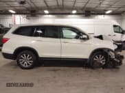 ✅ 2019 Honda Pilot EX-L • VIN: 5FNYF6H43KB023739 • Lot: 43177743. Listed on IAAI with 106,079 mi. Free auction sales archive from the USA and detailed vehicle history report at DreamBid. Image 14.