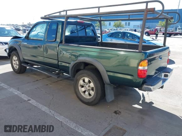 ✅ 2003 Toyota Tacoma PreRunner • VIN: 5TESM92N43Z164429 • Lot: 41398305. Listed on IAAI with 206,399 mi. Free auction sales archive from the USA and detailed vehicle history report at DreamBid. Image 3.