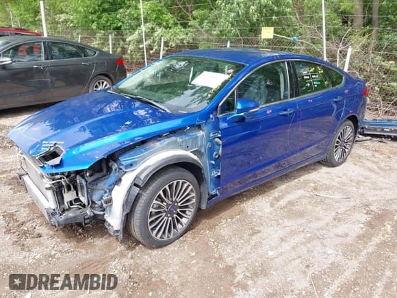 ✅ 2018 Ford Fusion Titanium • VIN: 3FA6P0D92JR233464 • Lot: 42188747. Listed on IAAI with 80,460 mi. Free auction sales archive from the USA and detailed vehicle history report at DreamBid. Image 2.