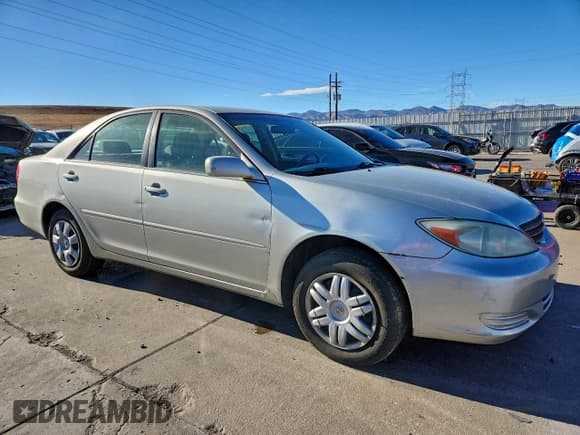 ✅ 2004 Toyota Camry LE • VIN: JTDBE32K940247369 • Lot: 94476305. Wystawiony na Copart z przebiegiem 176 333 mil. Bezpłatny archiwum sprzedaży aukcyjnych z USA i szczegółowy raport historii pojazdu na DreamBid. Zdjęcie 4.