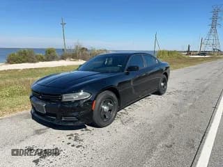 ✅ 2015 Dodge Charger Police • VIN: 2C3CDXAG3FH741452 • Lot: 91348715. Listed on Copart with 105,974 mi. Free auction sales archive from the USA and detailed vehicle history report at DreamBid. Image 2.