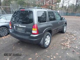 ✅ 2003 Mazda Tribute LX • VIN: 4F2YZ04113KM16983 • Lot: 43781248. Wystawiony na IAAI z przebiegiem 122 893 mil. Bezpłatny archiwum sprzedaży aukcyjnych z USA i szczegółowy raport historii pojazdu na DreamBid. Zdjęcie 4.
