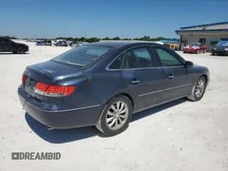 2006 Hyundai Azera SE с VIN KMHFC46FX6A105082, выставлен на аукционе Copart как лот 50761895 с пробегом 164 857 миль миль и Списание • Salvage title. История ставок и продаж доступна на DreamBid. Изображение 3.