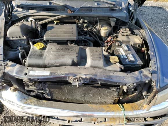 2000 Dodge Dakota Sport z VIN 1B7GG22N2YS659373, wystawiony jako Copart lot #75728094 z przebiegiem Nie podano mil oraz Szkoda całkowita • Salvage title. Historia ofert i sprzedaży dostępna na DreamBid. Obrazek 12.