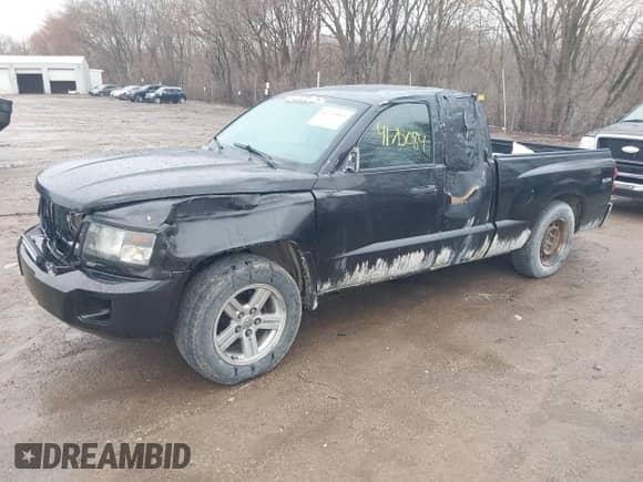 2010 Dodge Dakota Bighorn/Lonestar with VIN 1D7CW3BKXAS104194, listed as a IAAI auction lot 41715084 with 188,981 mi miles and . Bid and sale history available at DreamBid. Image 2.