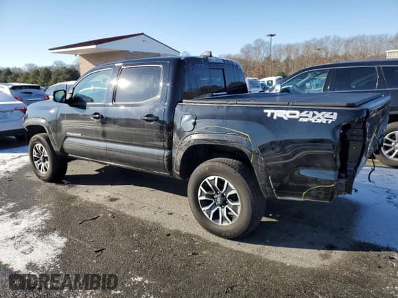 ✅ 2023 Toyota Tacoma SR • VIN: 3TYCZ5AN9PT167897 • Лот: 88285105. Опубликован ранее на Copart с пробегом 27 230 миль. Бесплатный доступ к архиву аукционных продаж из США и подробный отчёт об истории автомобиля на DreamBid. Изображение 2.