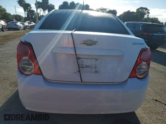 2013 Chevrolet Sonic LS с VIN 1G1JA5SH4D4174288, выставлен на аукционе Copart как лот 74352674 с пробегом Не указан миль и На запчасти • Non repairable. История ставок и продаж доступна на DreamBid. Изображение 6.