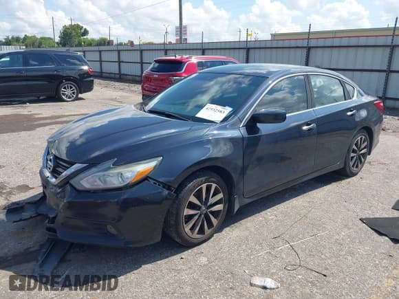 ✅ 2017 Nissan Altima SR • VIN: 1N4AL3APXHC495879 • Лот: 42932583. Опубликован ранее на IAAI с пробегом 153 940 миль. Бесплатный доступ к архиву аукционных продаж из США и подробный отчёт об истории автомобиля на DreamBid. Изображение 16.