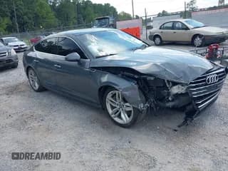 ✅ 2019 Audi A5 Sportback Premium • VIN: WAUANCF56KA051068 • Lot: 42857276. Wystawiony na IAAI z przebiegiem 133 930 mil. Bezpłatny archiwum sprzedaży aukcyjnych z USA i szczegółowy raport historii pojazdu na DreamBid. Zdjęcie 1.