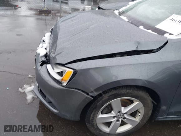 ✅ 2014 Volkswagen Jetta TDI w/Premium/Nav • VIN: 3VWLL7AJ4EM332920 • Lot: 41630948. Listed on IAAI with 148,754 mi. Free auction sales archive from the USA and detailed vehicle history report at DreamBid. Image 6.