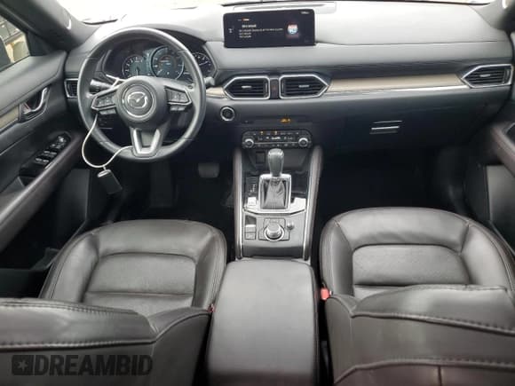 ✅ 2021 Mazda CX-5 Signature • VIN: JM3KFBEY2M0356013 • Lot: 66410025. Wystawiony na Copart z przebiegiem 47 279 mil. Bezpłatny archiwum sprzedaży aukcyjnych z USA i szczegółowy raport historii pojazdu na DreamBid. Zdjęcie 8.