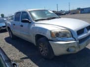 ✅ 2006 Mitsubishi Raider LS • VIN: 1Z7HC28K66S561607 • Лот: 42348069. Опубликован ранее на IAAI с пробегом 162 231 миль. Бесплатный доступ к архиву аукционных продаж из США и подробный отчёт об истории автомобиля на DreamBid. Изображение 1.