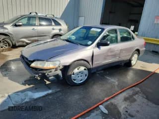 ✅ 2000 Honda Accord LX • VIN: 1HGCG1641YA048168 • Lot: 80166065. Listed on Copart with 64,489 mi. Free auction sales archive from the USA and detailed vehicle history report at DreamBid. Image 1.