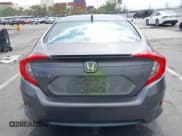 ✅ 2018 Honda Civic EX-T • VIN: JHMFC1F38JX020125 • Lot: 42342438. Listed on IAAI with 115,037 mi. Free auction sales archive from the USA and detailed vehicle history report at DreamBid. Image 17.