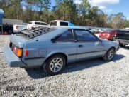 ✅ 1983 Toyota Celica • VIN: JT2RA64L7D6174381 • Lot: 75986554. Wystawiony na Copart z przebiegiem 312 583 mil. Bezpłatny archiwum sprzedaży aukcyjnych z USA i szczegółowy raport historii pojazdu na DreamBid. Zdjęcie 3.