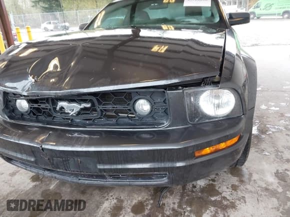 ✅ 2007 Ford Mustang Deluxe • VIN: 1ZVHT80NX75349309 • Lot: 43716028. Listed on IAAI with 148,642 mi. Free auction sales archive from the USA and detailed vehicle history report at DreamBid. Image 6.
