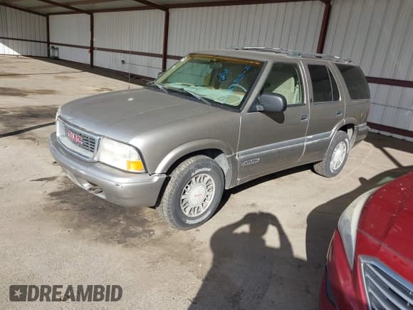 ✅ 1999 GMC Jimmy SLE • VIN: 1GKDT13W7X2529298 • Лот: 41556249. Опубликован ранее на IAAI с пробегом 114 750 миль. Бесплатный доступ к архиву аукционных продаж из США и подробный отчёт об истории автомобиля на DreamBid. Изображение 2.