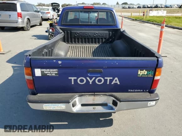 ✅ 1997 Toyota Tacoma • VIN: 4TAVL52NXVZ238083 • Lot: 67034755. Listed on Copart with 214,920 mi. Free auction sales archive from the USA and detailed vehicle history report at DreamBid. Image 6.