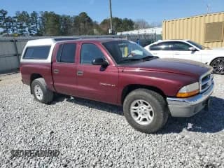 ✅ 2001 Dodge Dakota Sport • VIN: 1B7GL2ANX1S102505 • Lot: 47586155. Wystawiony na Copart z przebiegiem 242 272 mil. Bezpłatny archiwum sprzedaży aukcyjnych z USA i szczegółowy raport historii pojazdu na DreamBid. Zdjęcie 4.