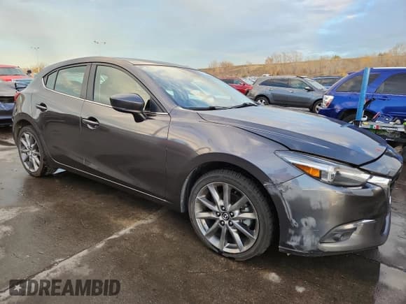 ✅ 2018 Mazda 3 Grand Touring • VIN: 3MZBN1M39JM265774 • Лот: 91309895. Опубликован ранее на Copart с пробегом 59 343 миль. Бесплатный доступ к архиву аукционных продаж из США и подробный отчёт об истории автомобиля на DreamBid. Изображение 4.