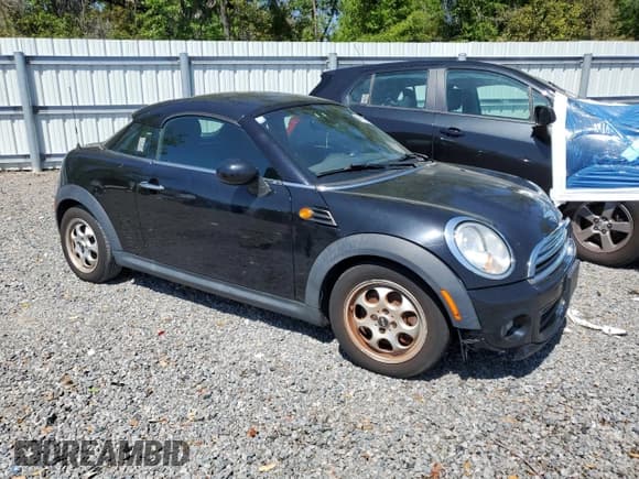 ✅ 2013 MINI Coupe • VIN: WMWSX1C54DT507731 • Lot: 49261315. Listed on Copart with 111,881 mi. Free auction sales archive from the USA and detailed vehicle history report at DreamBid. Image 4.