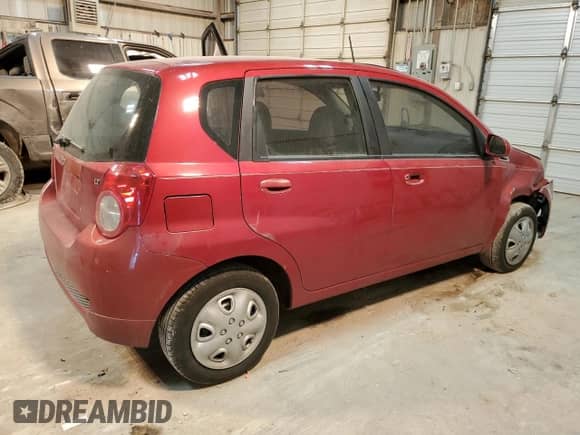 2009 Chevrolet Aveo 1LT z VIN KL1TD66E79B646149, wystawiony jako Copart lot #87581235 z przebiegiem 156 634 mil mil oraz Szkoda całkowita • Salvage title. Historia ofert i sprzedaży dostępna na DreamBid. Obrazek 3.