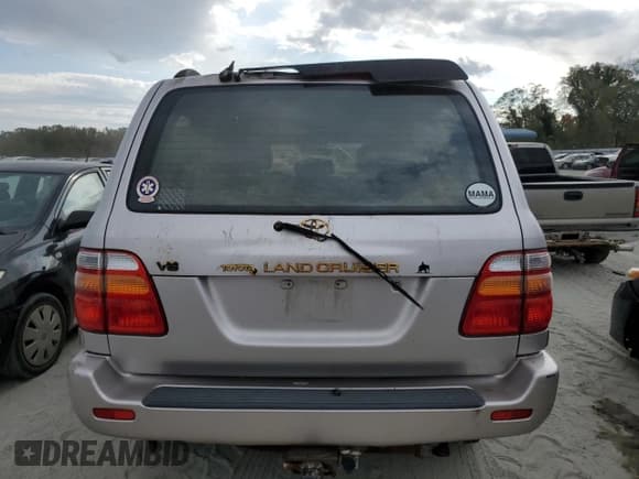 ✅ 1999 Toyota Land Cruiser • VIN: JT3HT05JXX0040905 • Lot: 75091644. Listed on Copart with 272,102 mi. Free auction sales archive from the USA and detailed vehicle history report at DreamBid. Image 6.