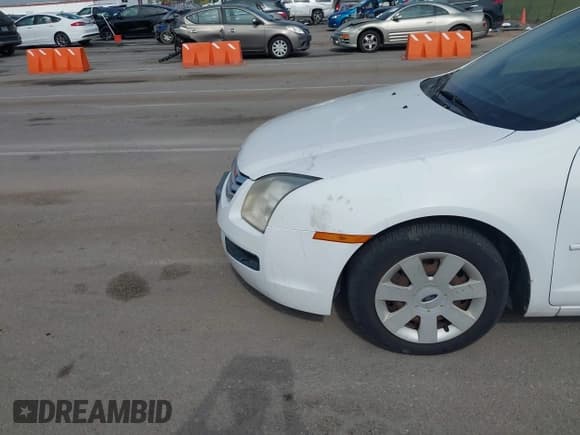 ✅ 2007 Ford Fusion S • VIN: 3FAHP06Z07R258328 • Лот: 43454699. Опубликован ранее на IAAI с пробегом 184 783 миль. Бесплатный доступ к архиву аукционных продаж из США и подробный отчёт об истории автомобиля на DreamBid. Изображение 6.