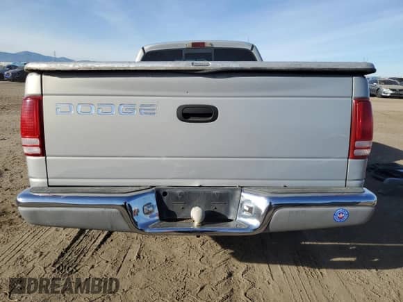 1998 Dodge Dakota SLT z VIN 1B7GL22Y6WS549252, wystawiony jako Copart lot #86925244 z przebiegiem 246 913 mil mil oraz Szkoda całkowita • Salvage title. Historia ofert i sprzedaży dostępna na DreamBid. Obrazek 6.