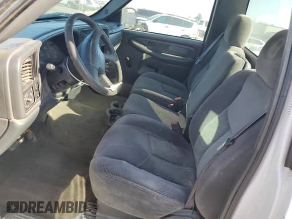 2003 Chevrolet Silverado 1500 with VIN 1GCEC14V03Z105274, listed as a Copart auction lot 70592284 with 145,652 mi miles and Salvage title. Bid and sale history available at DreamBid. Image 7.