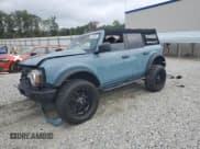 ✅ 2021 Ford Bronco • VIN: 1FMDE5BH8MLB06988 • Lot: 84236085. Listed on Copart with 31,093 mi. Free auction sales archive from the USA and detailed vehicle history report at DreamBid. Image 1.