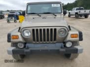 ✅ 2004 Jeep Wrangler Rubicon • VIN: 1J4FA69S34P756394 • Lot: 86123855. Wystawiony na Copart z przebiegiem 62 500 mil. Bezpłatny archiwum sprzedaży aukcyjnych z USA i szczegółowy raport historii pojazdu na DreamBid. Zdjęcie 5.