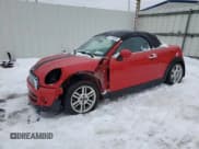 ✅ 2013 MINI Roadster • VIN: WMWSY1C51DT625586 • Lot: 44134685. Listed on Copart with 60,159 mi. Free auction sales archive from the USA and detailed vehicle history report at DreamBid. Image 1.